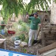 A volunteer working in the Hansen Community Gardens