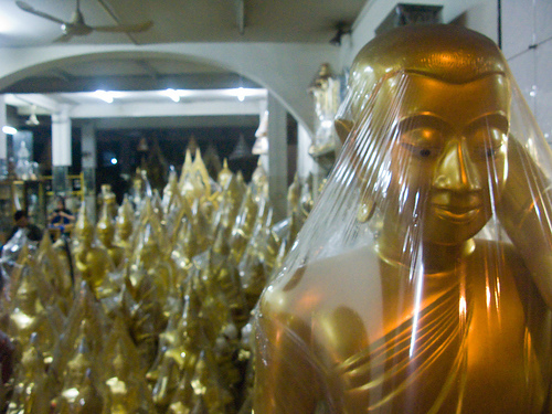 covered statue clothing plastic wrap