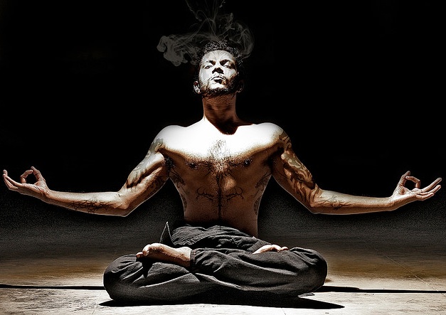 man in yoga pose, CBD anxiety