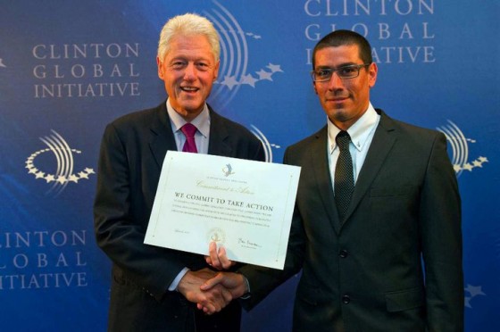 Bill Clinton congratulating Elan Orian on Comet-ME's work