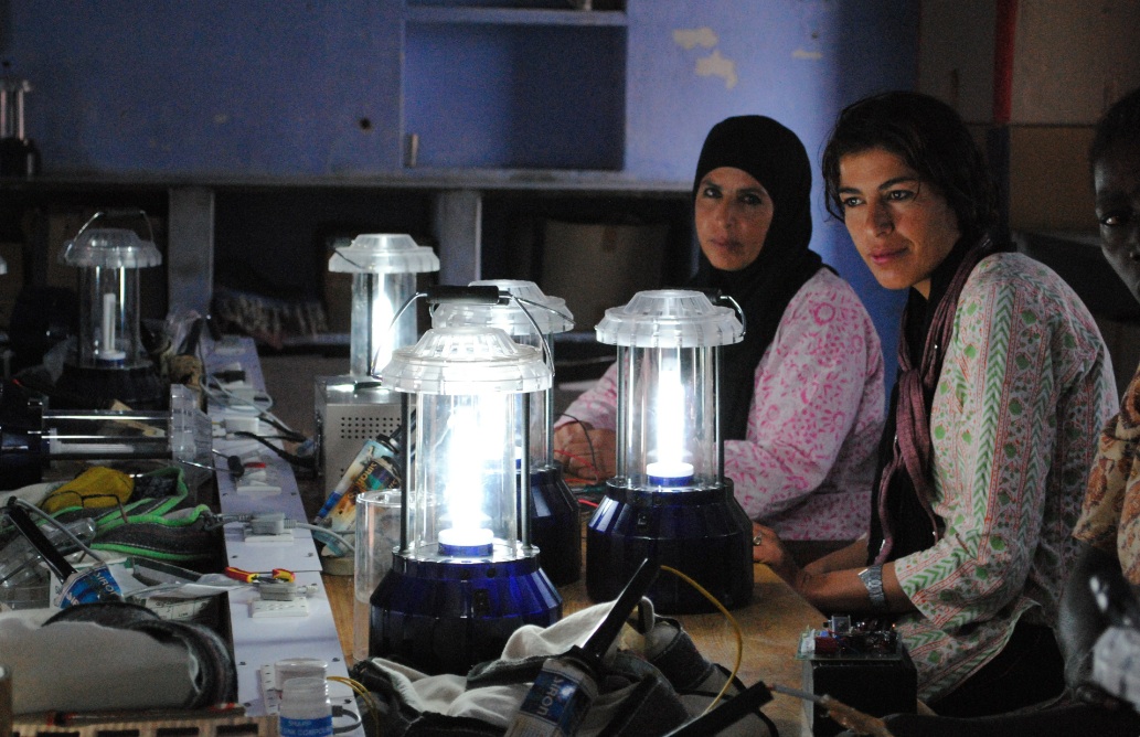 bedouin women by gas lamplight