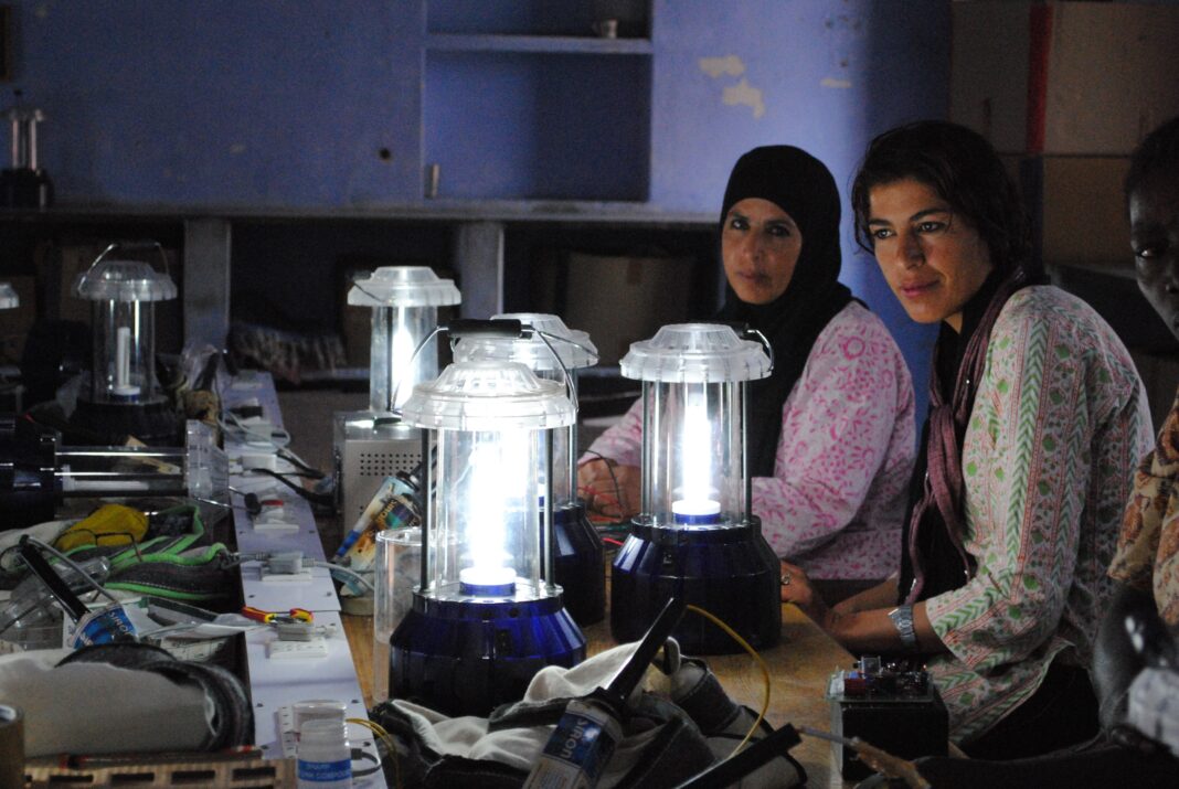 barefoot college helps bedouin women like these ones working by gas burners, learn technical skills