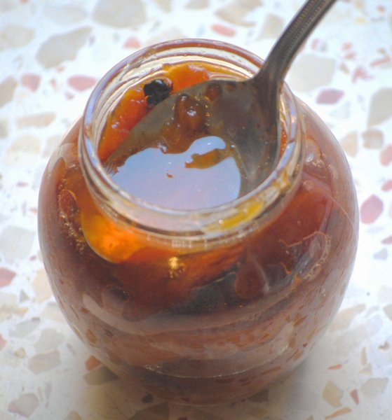 baked apricot jam, miriam kresh in small glass jar with spoon sticking out