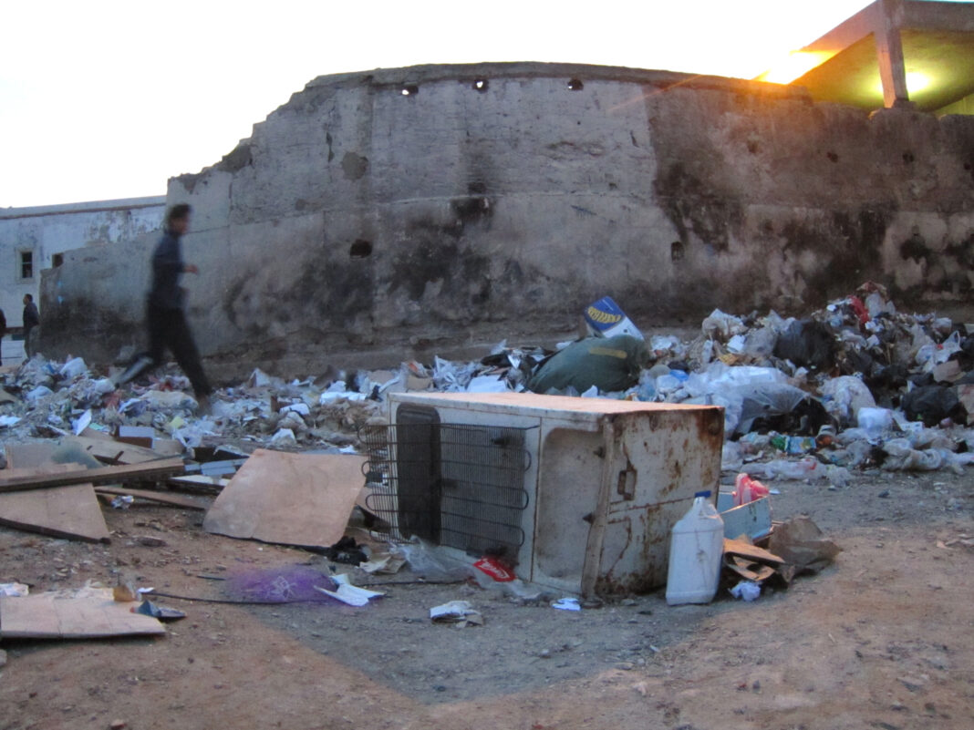 Another Day in Tunisia: Chasing Balls Through Trash (PHOTOS)
