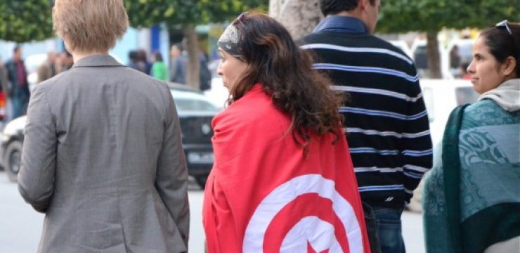 Tunisian-Woman-Wrapped-in-Flag.jpg