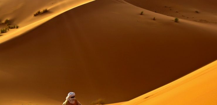 man-walks-moroccan-desert.jpg