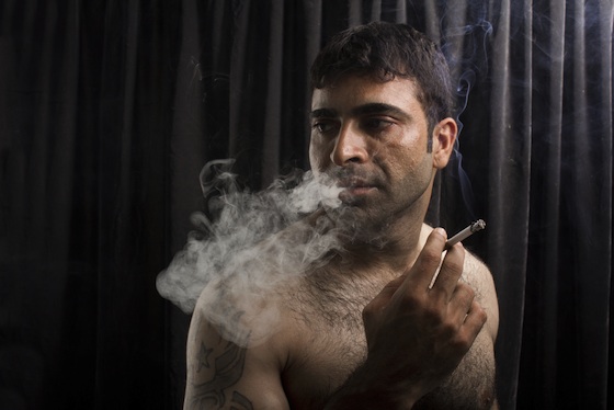 smoking ban, Lebanon, man smoking, Law 174, anti-tobacco legislation, hospitality industry