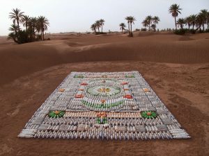 Dazzling Carpet of Plastic Bottles Adorns the Moroccan Desert