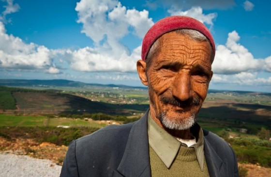 arab man red hat in nature