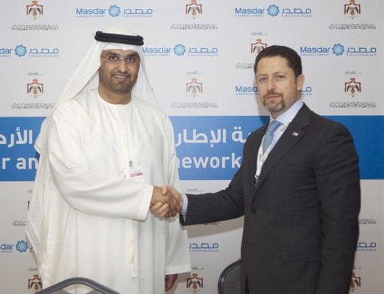 Alaa Batayneh with Masdar CEO Sultan Ahmed Al Jaber jordan minister of energy Masdar Jordan Public Private Partnership.jpeg