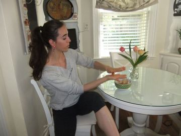 rolling the sugar wax into a ball