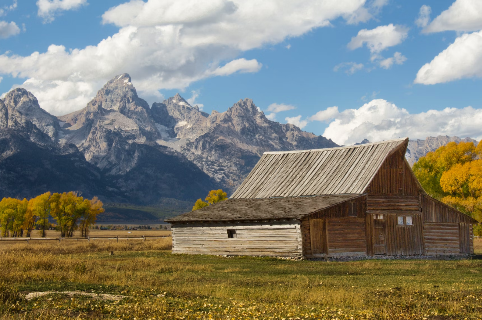 cabin in alaska, blue sky clouds 