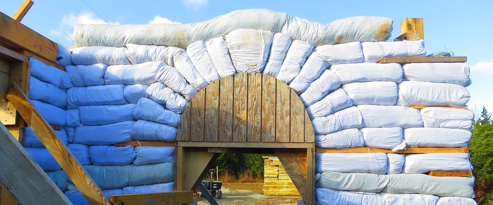 round home window installation, curved wall window solution, eco architecture window design, window in round room, sustainable circular house design, curved wall glazing, dome home window example, natural building window framing, round wall daylighting, curved architecture window detail, passive solar window in round room, eco-friendly home design, window buck in curved wall, wood frame insert for round home window, earthbag dome window buck, flat window frame in dome house, rectangular window in round room, inflatable concrete house window buck, superadobe window frame detail, embedded window box in curved earthbag wall, sustainable window install, monolithic dome window mounting, flat plane window insert, eco building techniques window buck, arched window in adobe home, vaulted opening in round wall, traditional earthen window design, adobe arched window reveal, curved adobe wall with arch window, passive cooling arched window, superadobe arched window form, earth architecture arch window detail, natural building vault window, thick wall arched reveal daylighting, eco desert architecture window, flat section in dome wall for window, buttress window design in round home, earthbag flat window mount, curved house with flat window panel, round room partial flat wall for window, hybrid curved-flat wall glazing, eco resort dome window flat area, sustainable home buttress window example, round-house window detail, porthole window in dome home, circular window in curved wall, eco dome porthole glazing, inflatable concrete house porthole window, small round window in adobe wall, marine-style window in dome, tiny home with circular window, storm-resistant dome porthole window, monolithic dome circular window, bubble house porthole window, minimalist round window design, recessed window in thick curved wall, passive cooling window reveal, inward-tilted window opening, deep window niche in adobe home, desert architecture recessed window, round wall window shading, tilted window frame ventilation, natural cooling window channel, curved wall window recess design, Mediterranean vernacular window recess, thick-wall window shading technique, eco passive design window