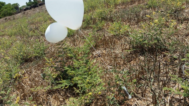 balloon with molotov cocktail