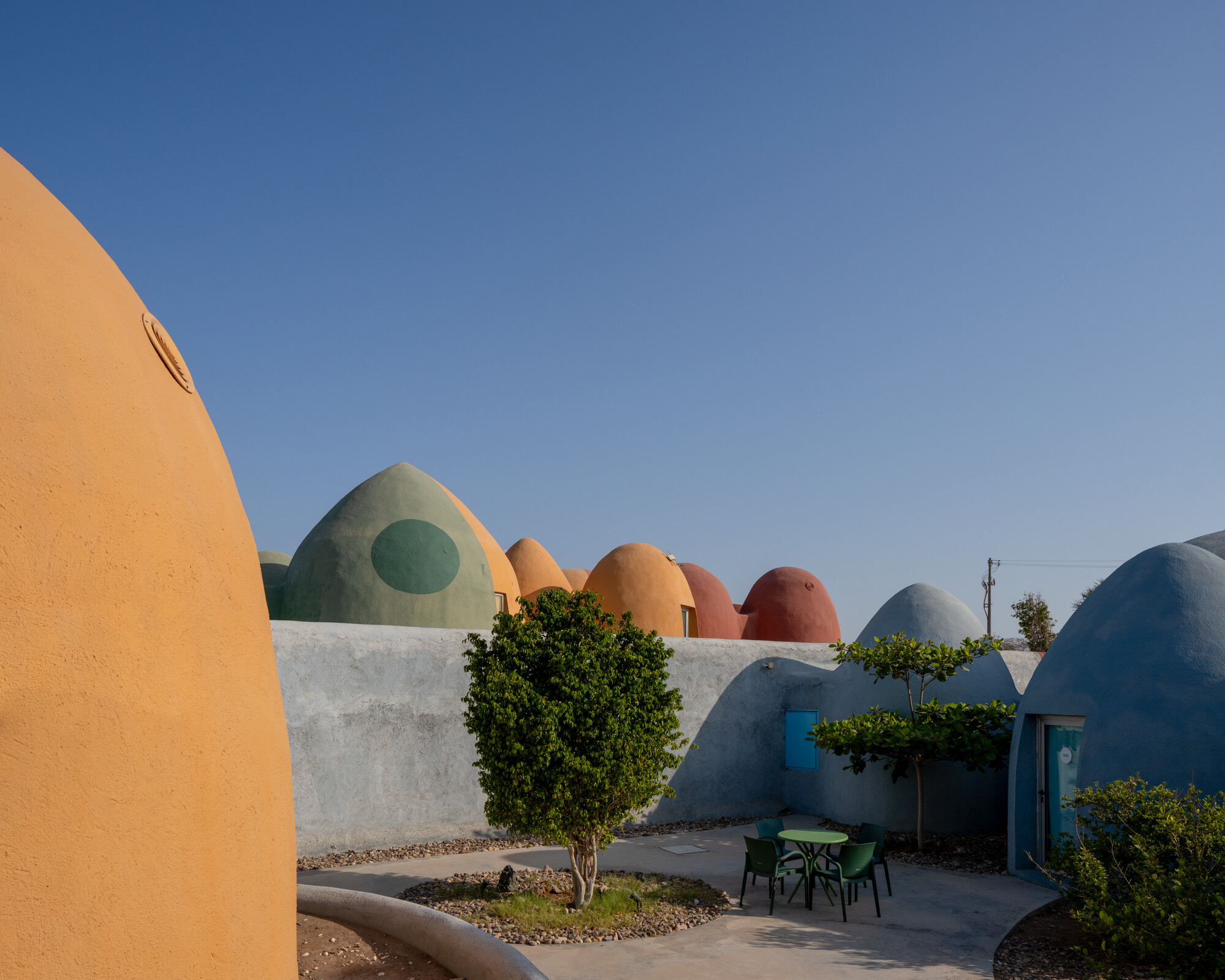 Hormuz Island, Majara Residence, ZAV Architects, sustainable architecture Iran, Hormuz eco tourism, Aga Khan Award architecture, Superadobe construction, Nader Khalili, earth architecture, desert architecture, Persian Gulf island, eco resort Iran, sustainable tourism Hormuz, coastal development Iran, turtle nesting beach Hormuz, hawksbill turtle Iran, green turtle Persian Gulf, marine conservation Iran, biodiversity Hormuz Island, wildlife mapping tourism, ecological design architecture, climate responsive design, off grid architecture, local materials construction, community based tourism Iran, cultural tourism Hormuz, Iranian architecture innovation, sustainable building materials, natural building techniques, coastal ecosystem Iran, environmental impact architecture, regenerative tourism, island conservation, soil composition beach, coastal geomorphology Hormuz, Persian Gulf ecology, NGO conservation Iran, participatory conservation, invasive species removal, Prosopis juliflora Iran, native reforestation, mangrove ecology Gulf, sustainable wastewater treatment, composting systems eco resort, circular economy tourism, low impact development, resilient architecture, autonomous eco systems design, marine habitat protection, sustainable infrastructure Middle East, eco architecture photography, architecture detail Superadobe, construction techniques earth dome