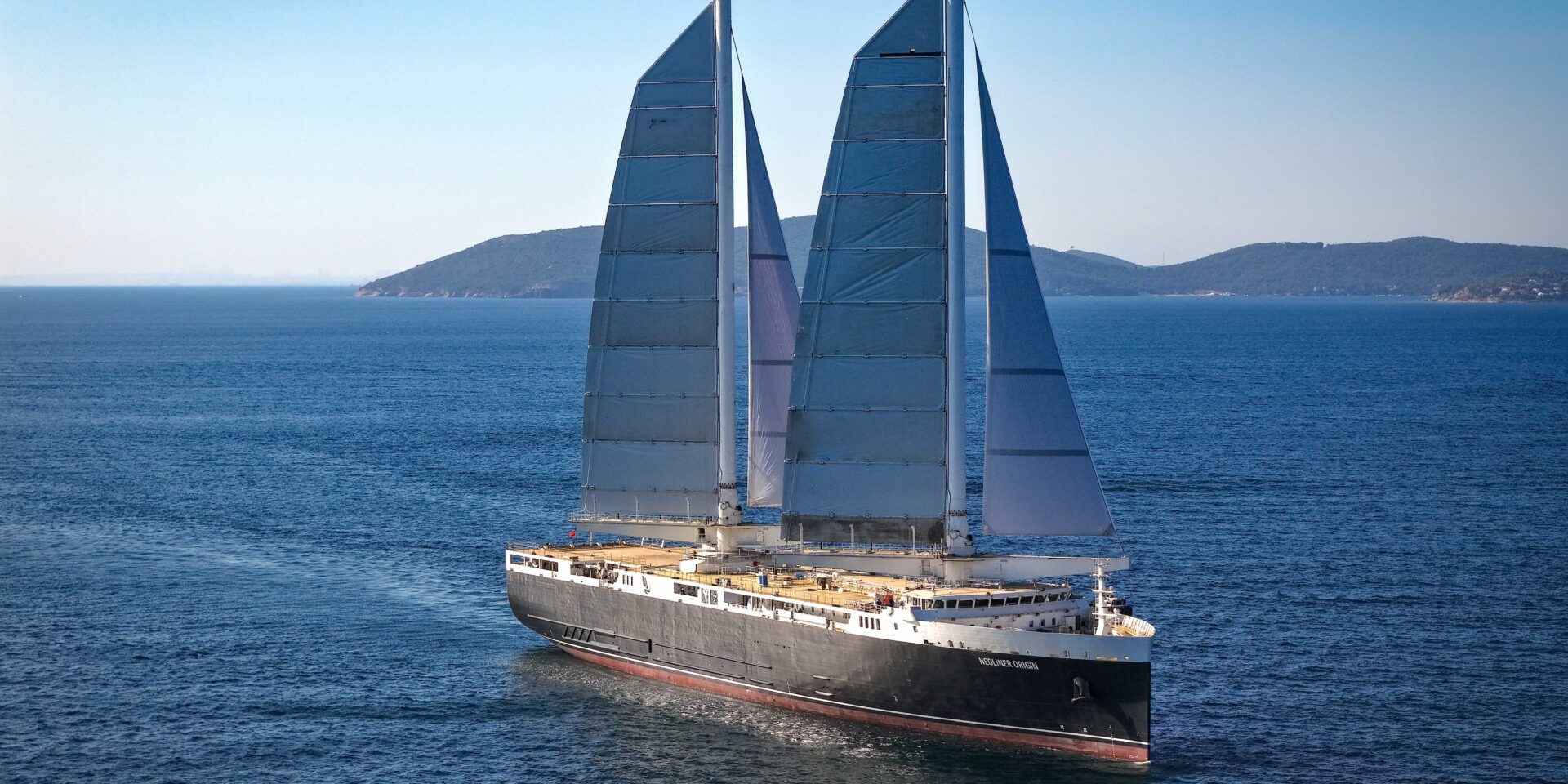 wind powered cargo ship,Neoliner Origin sail vessel,
low emission shipping technology,
wind propulsion cargo vessel,
Neoline sustainable shipping,
industrial sail powered ship,
eco friendly ro-ro vessel,
rigid wing sail cargo ship,
modern wind assisted marine transport,
zero emission maritime logistics,
wind powered ro-ro ship under sail,
sustainable transatlantic shipping,
green maritime innovation,
wind energy ship propulsion,
clean shipping alternative,
ocean freight decarbonization,
wind driven cargo transport,
sustainable ship design,
renewable energy maritime vessel,
green shipping technology