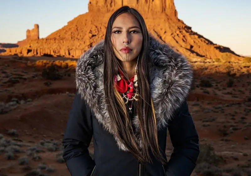 Indigenous model, actress, and land protector Quannah ChasingHorse will be honored next month at the inaugural Hollywood Climate Summit Leadership Recognition Ceremony for using her platform to advance climate action and environmental justice. The Hollywood Climate Summit announced May 22 that ChasingHorse is among the first recipients of its new leadership awards program, which recognizes leaders across entertainment, media, and culture who are driving action on climate and sustainability issues. ChasingHorse will receive the Amplifier Award, which honors “a cultural leader using their platform and influence to advance climate action and environmental justice for the next generation.” The ceremony will take place June 3 at the Academy of Motion Picture Arts and Sciences’ Samuel Goldwyn Theater in Beverly Hills during the opening day of the seventh annual Hollywood Climate Summit. A Han Gwich’in and Sicangu/Oglala Lakota land protector from Eagle Village, Alaska, and the tribes of South Dakota, ChasingHorse has become one of the most visible Indigenous figures in fashion and entertainment while consistently centering Indigenous values, land protection, and Native representation in her public work. A fourth-generation land protector, ChasingHorse has described her connection to her homelands and traditional ways of life as the foundation of her activism and career. She first gained international attention through a 2020 Calvin Klein campaign and has since worked with major global fashion houses while appearing on magazine covers including Vogue, Elle, and Harper’s Bazaar. She has also expanded into film and television, appearing in Reservation Dogs and Thin Places. Her short film Walking Two Worlds received awards and streams through The North Face channels.