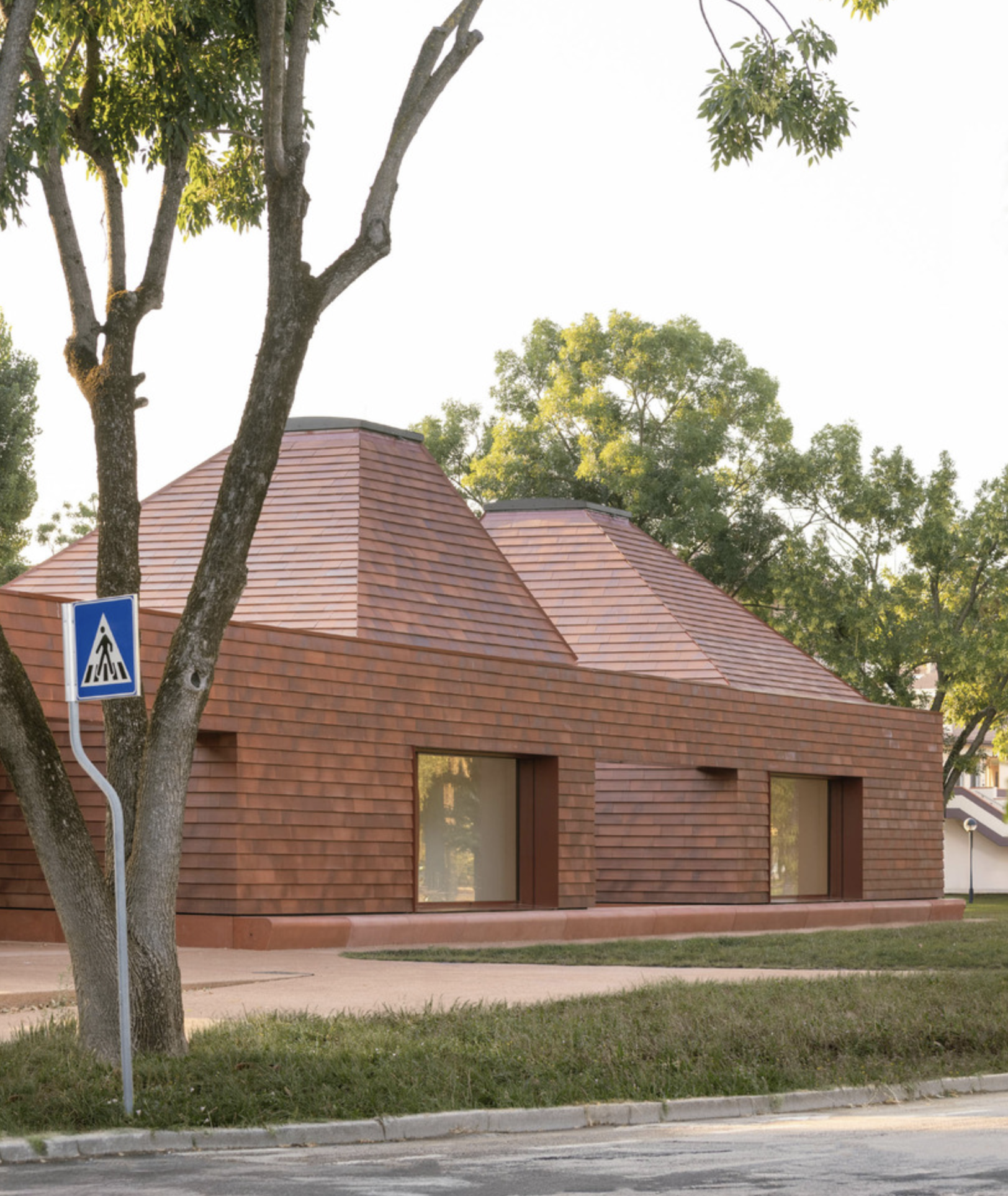 Kinder Rain, a terracotta, vernacular-inspired play space