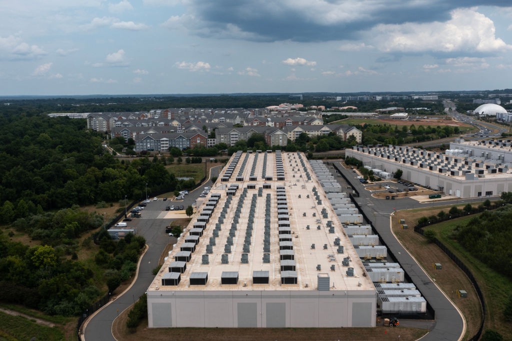 An aerial view shows an Amazon data center last year in Ashburn, Virginia. Maryland officials are trying to balance between opponents of data centers and their environmental and energy demands, and the wholesale acceptance of centers by Virginia, for their jobs and tax revenues.