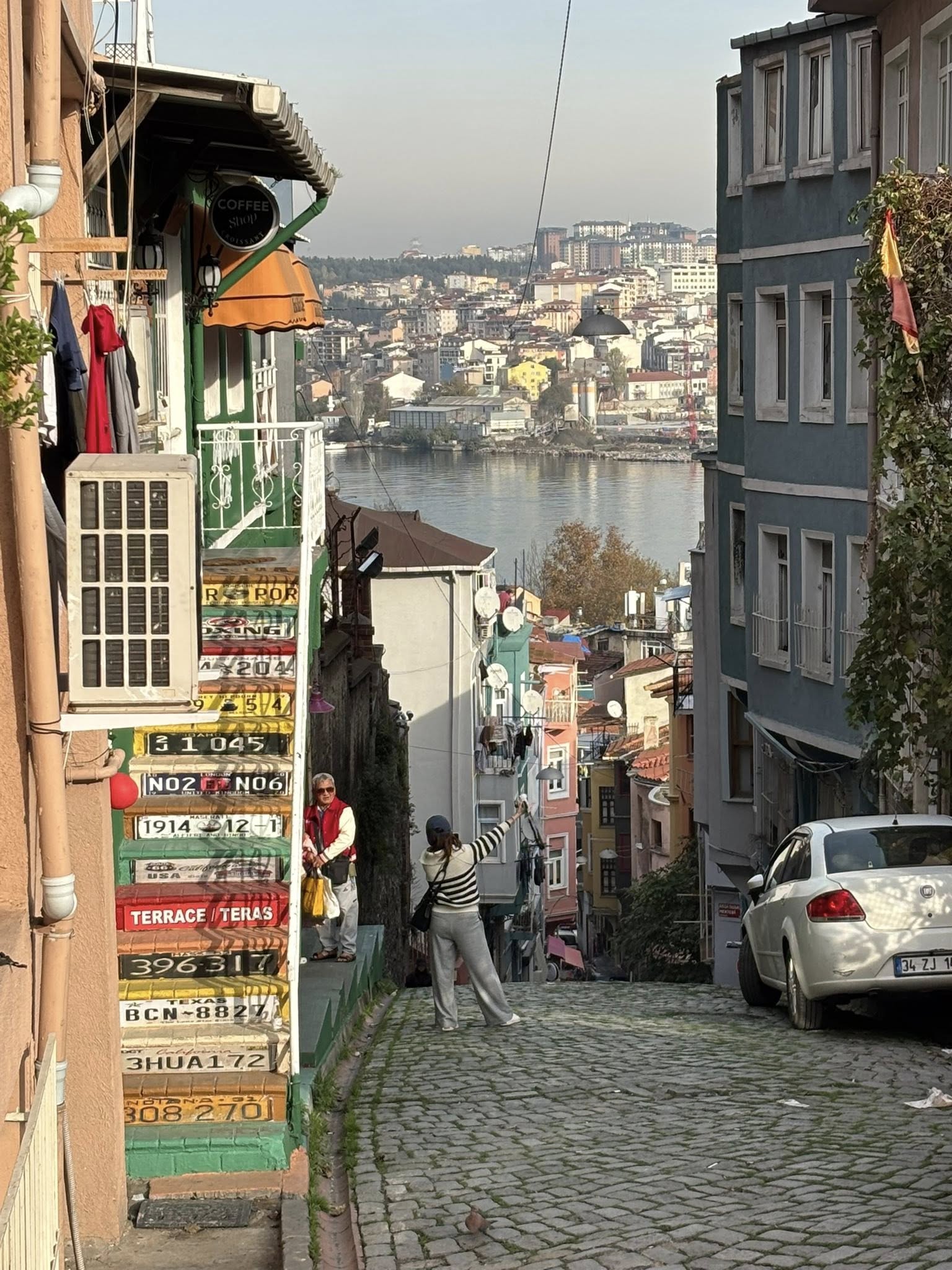 View toward the Golden Horn from Balat, Istanbul, with fishermen along the water
