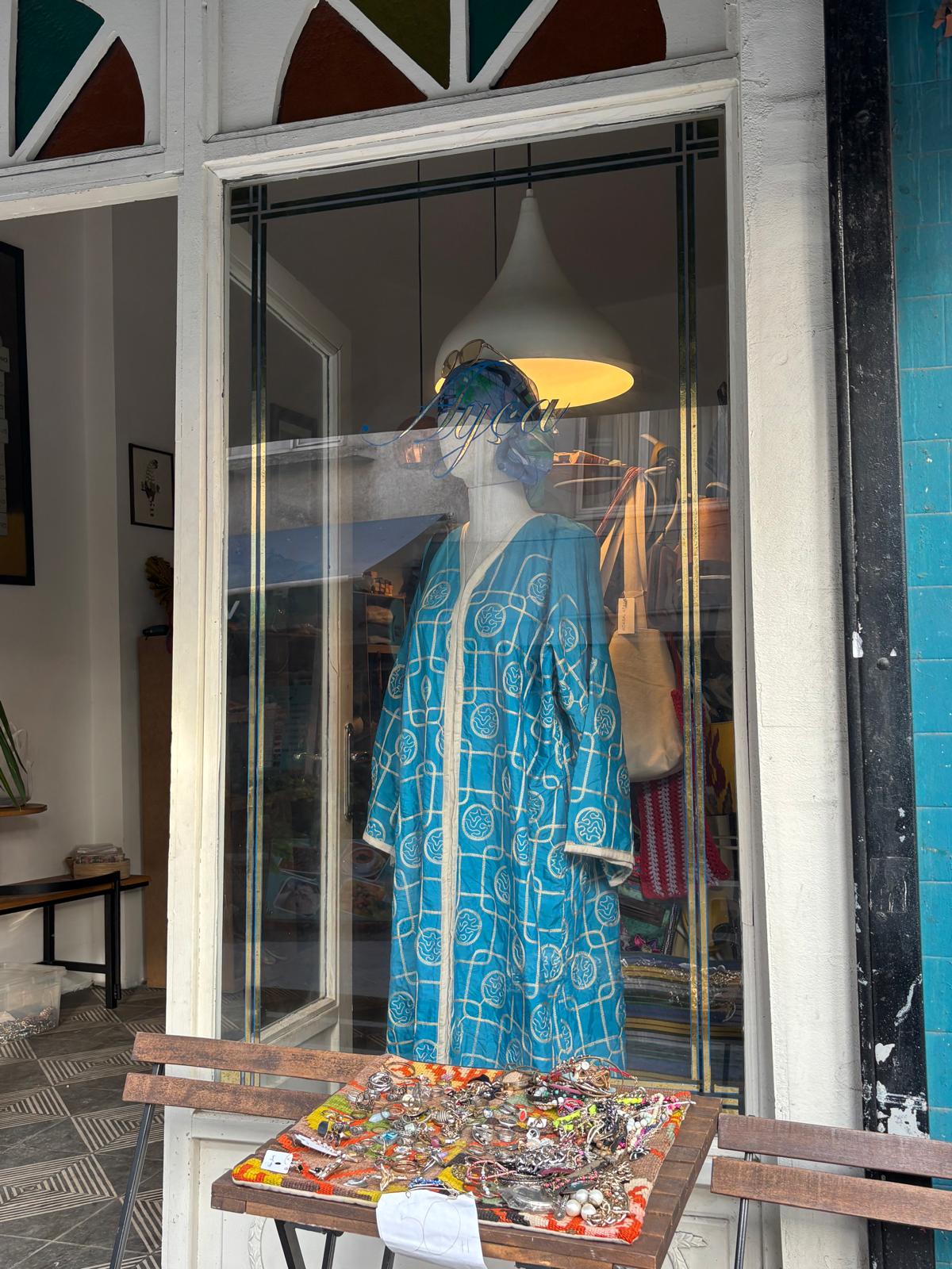 Second-hand clothing and vintage items in a Balat shop in Istanbul