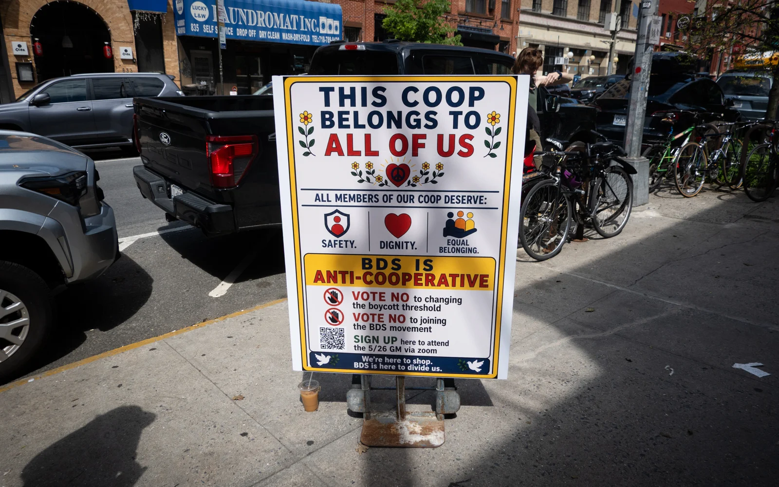 A sign for a campaign against an Israel boycott at the Park Slope Food Coop in Brooklyn, New York City, May 26, 2026. (Luke Tress/Times of Israel)