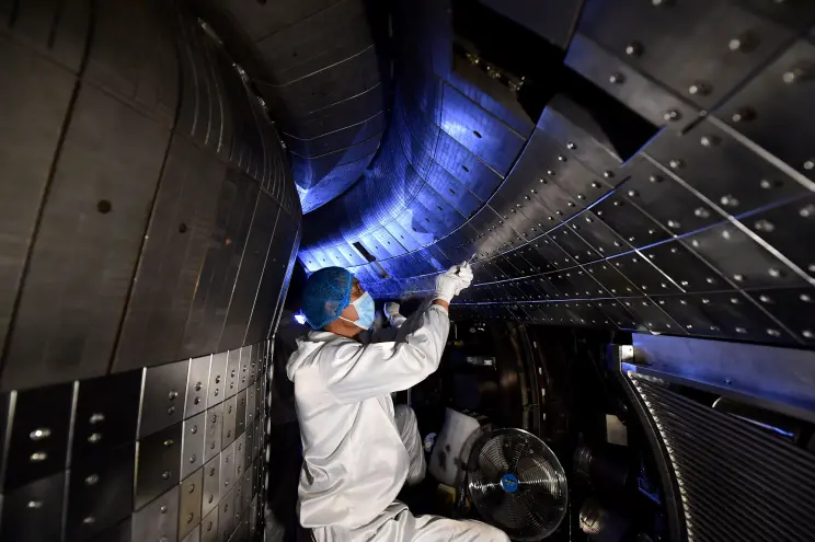 Researchers working on China’s Experimental Advanced Superconducting Tokamak (EAST)