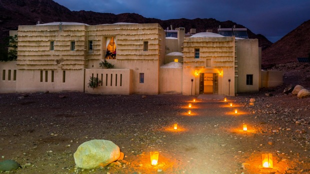 eco hotel lit by candles