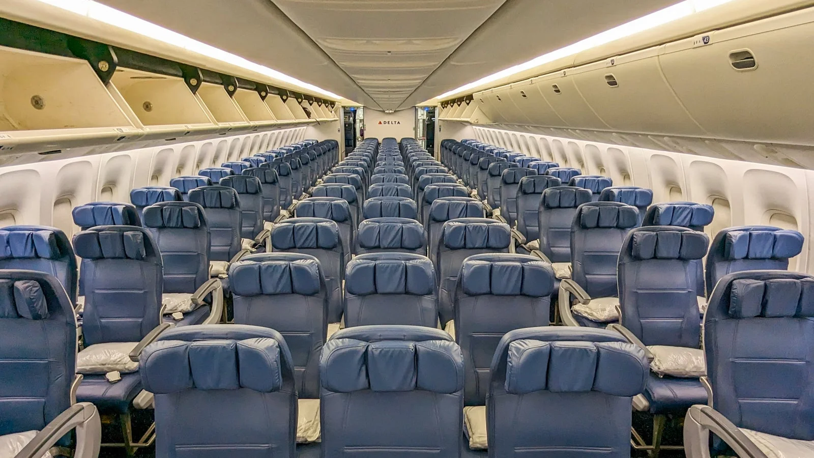 Inside the cabin if you flying Delta, Economy class. Should airlines position the plane so the young ones can get out first? 