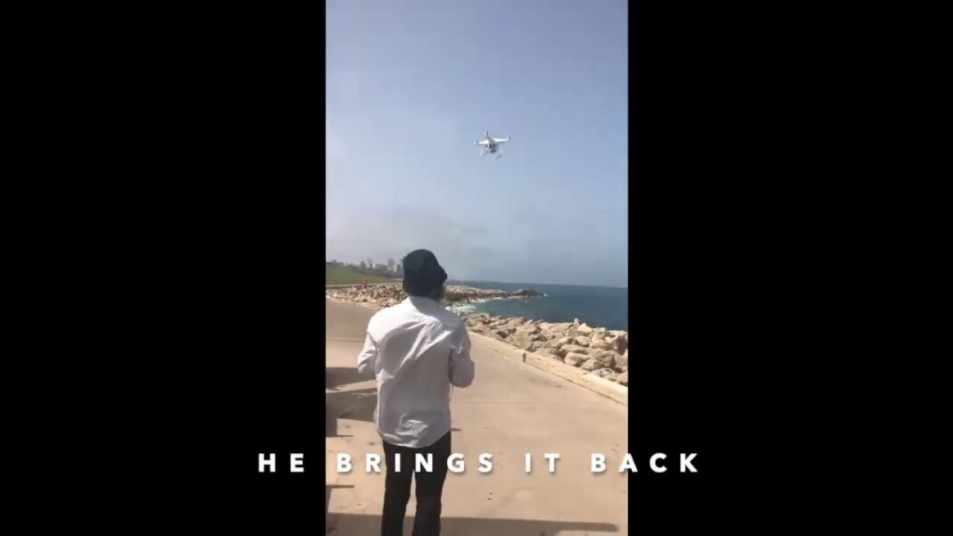 video of religious Israel Jew fishing for his family's dinner on Shabbat