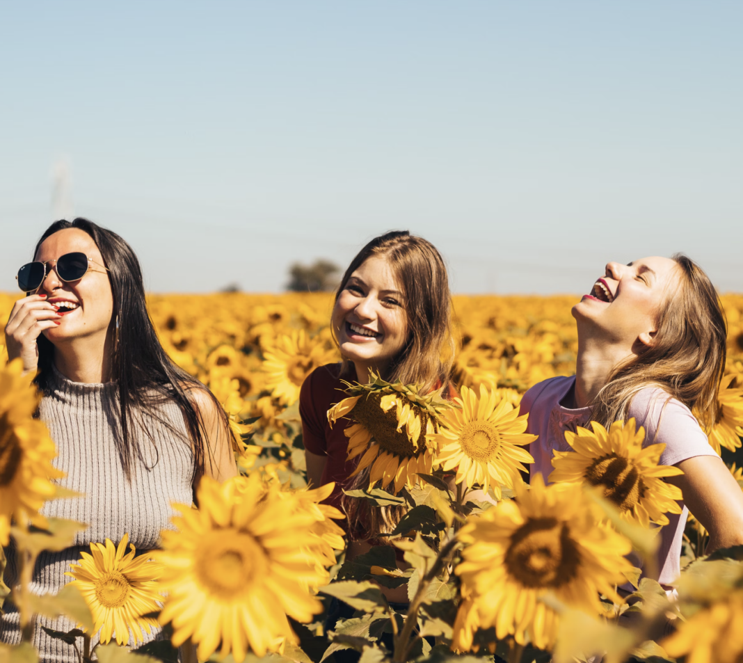 women with sunflowers