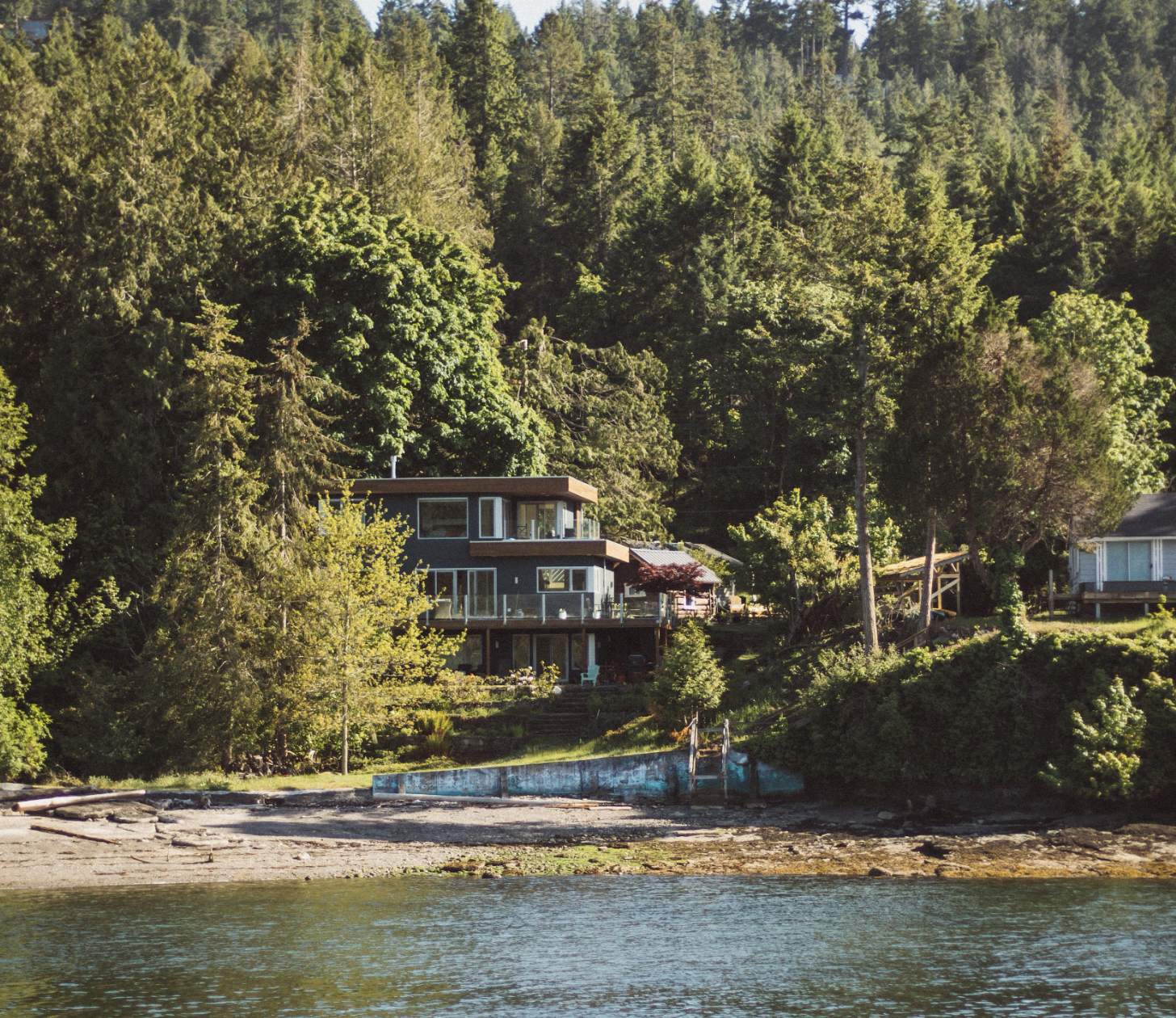 Glass house on a lake in Canada