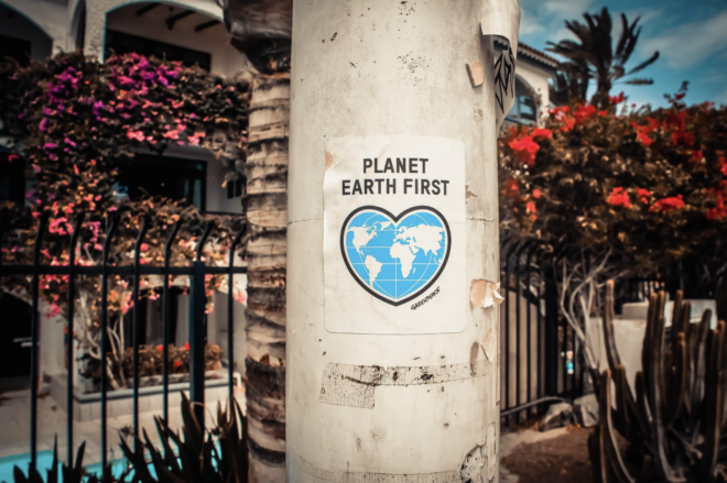 gerenpeace poster on pole, planet earth first