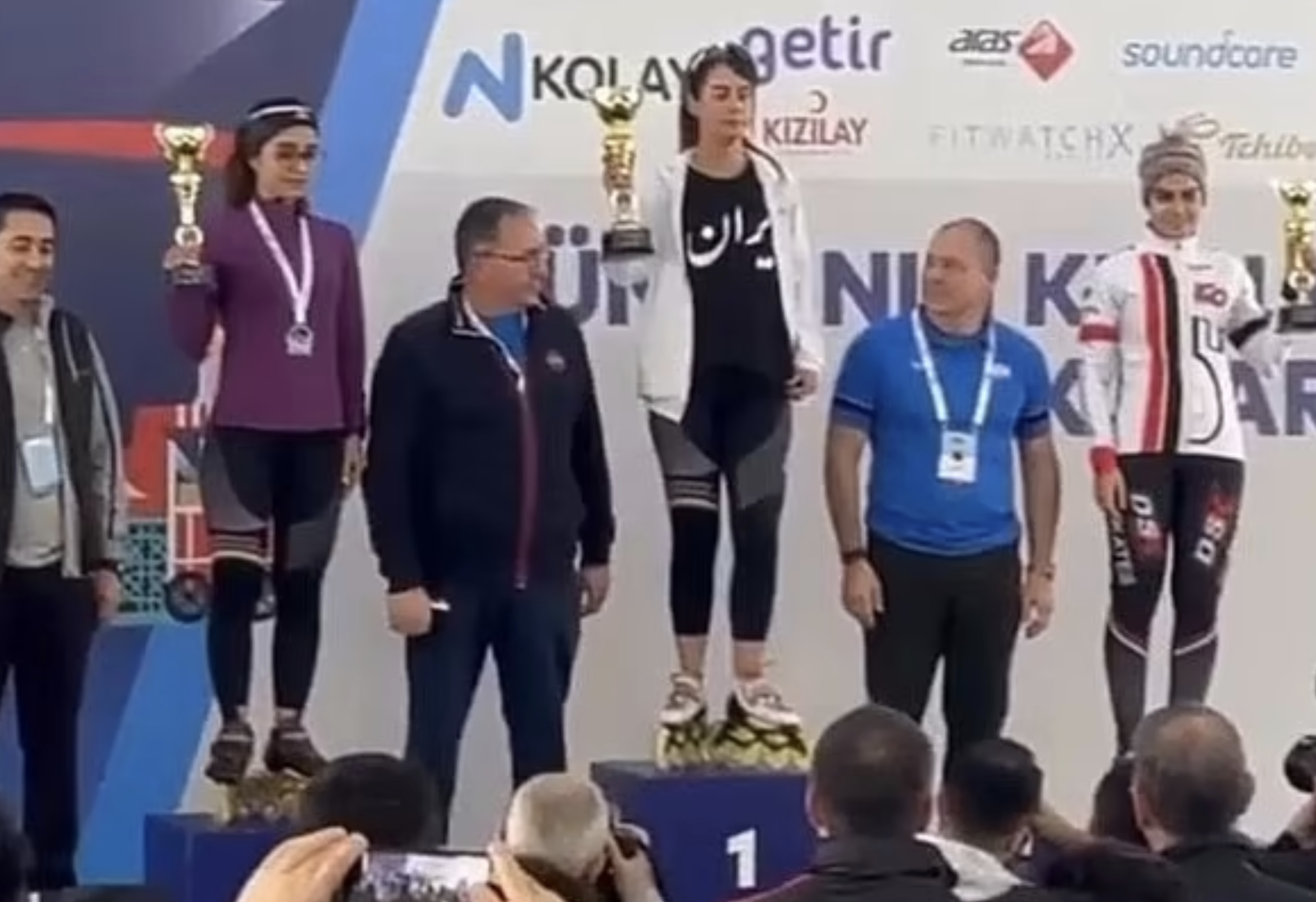 Iran speed skater, hijab on podium