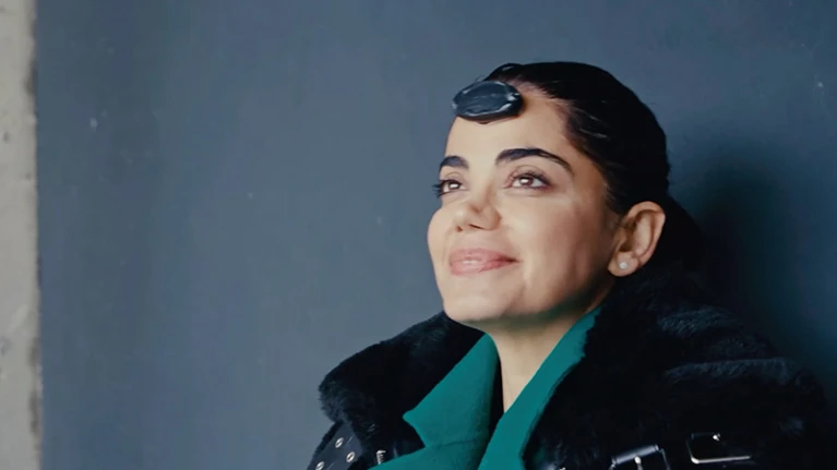 Kiana Aran wore an EEG on her forehead to measure her brain activity while in the cave.Credit: Kinga Janowska and Wojciech Ananda Jay founders of Darkness Cave Retreat