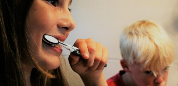 kids-brushing-teeth-toddler-blond-teen-white-tootbrush.jpg