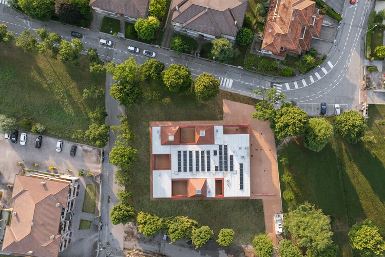 Kinder Rain, a terracotta, vernacular-inspired play space