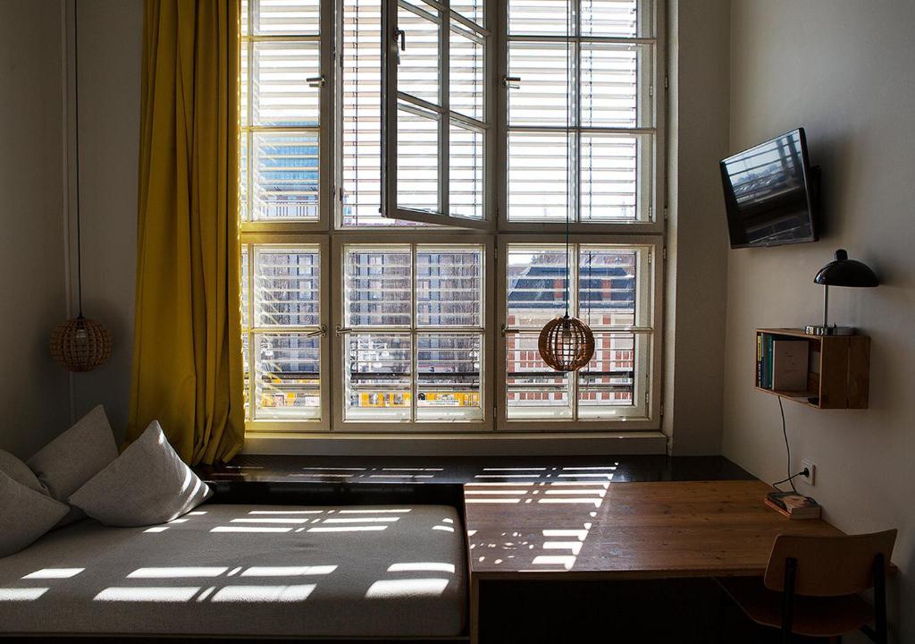 michelberger hotel berlin, sustainable design hotel berlin, eco friendly hotel berlin, family stay michelberger, berlin loft hotel room, warschauer strasse hotel, berlin creative hotel stay, boutique hotel friedrichshain, brunch at michelberger hotel, michelberger hotel lobby, berlin hipster hotel, east berlin factory hotel conversion, michelberger vegan breakfast, michelberger hotel interior design, berlin hotel near raw gelände, michelberger hotel travel review, green prophet berlin stay, michelberger hotel aromatherapy lobby, berlin eco hotel loft bed, michelberger hotel family room