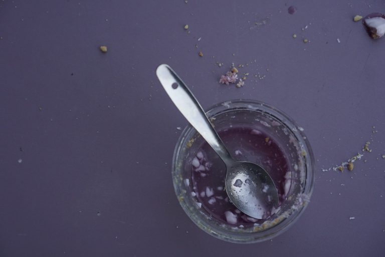 Creamy white malabi pudding with pistachios