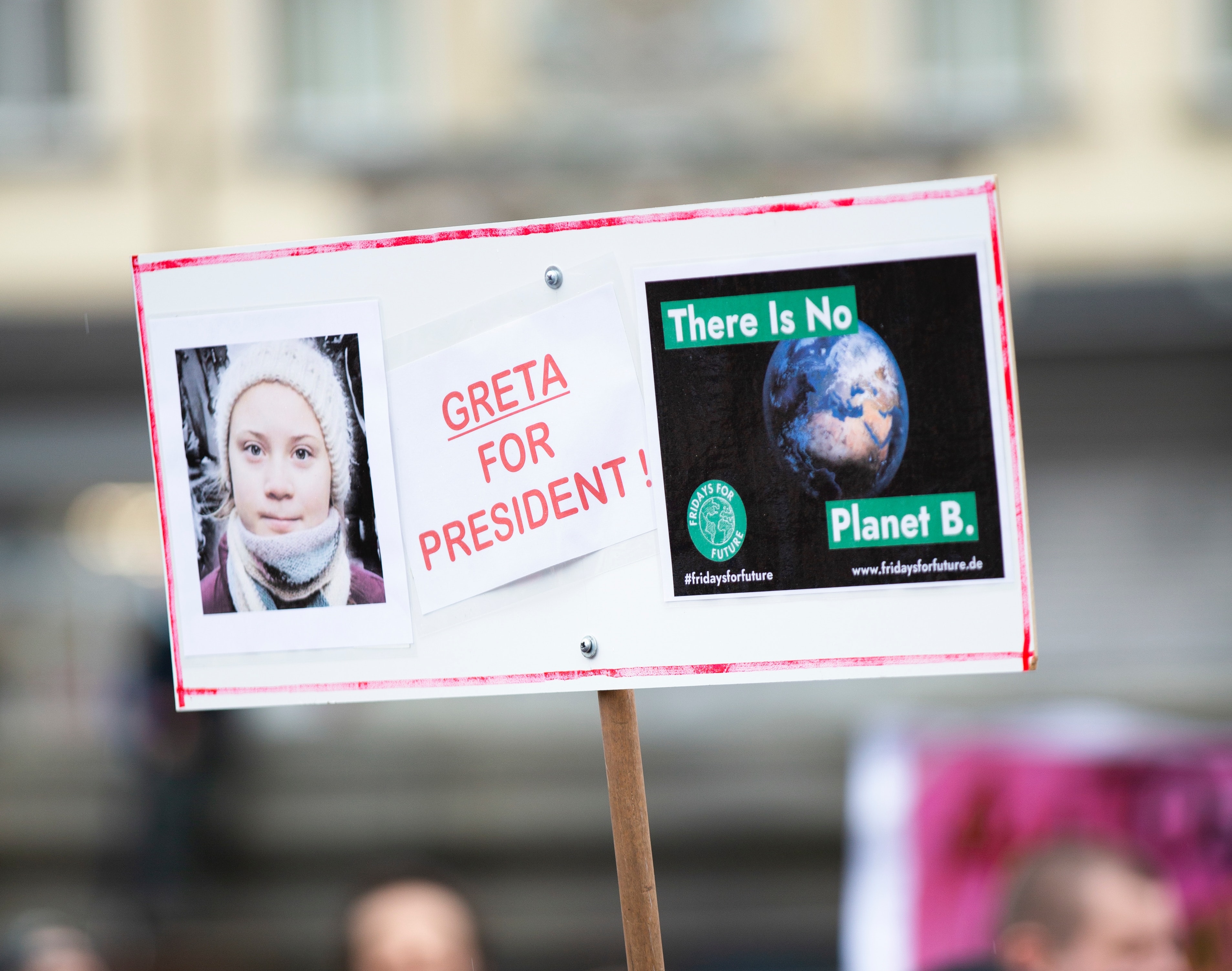 Greta Thunberg on a sign protesting