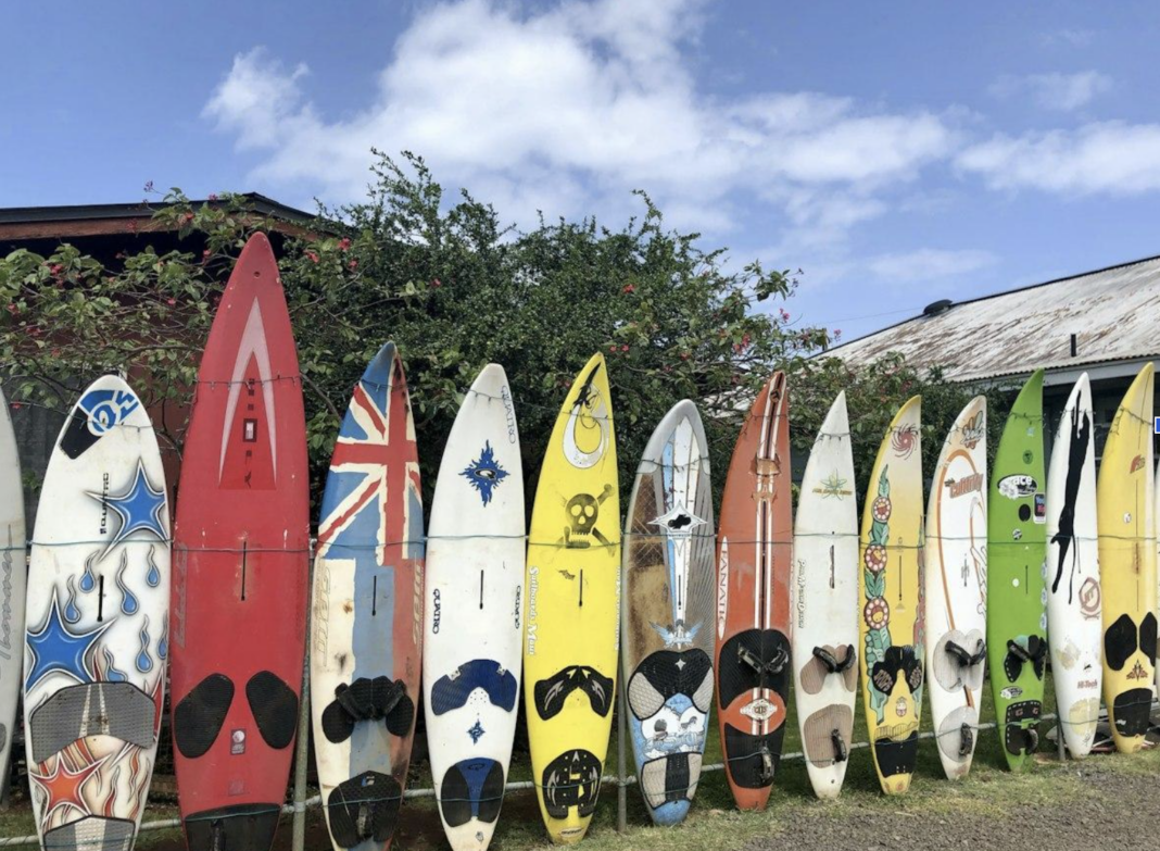 Surfboards come in a wide range of shapes, sizes and volumes, each suited to different surfers and wave conditions. Photo by Monica Bourgeau on Unsplash.