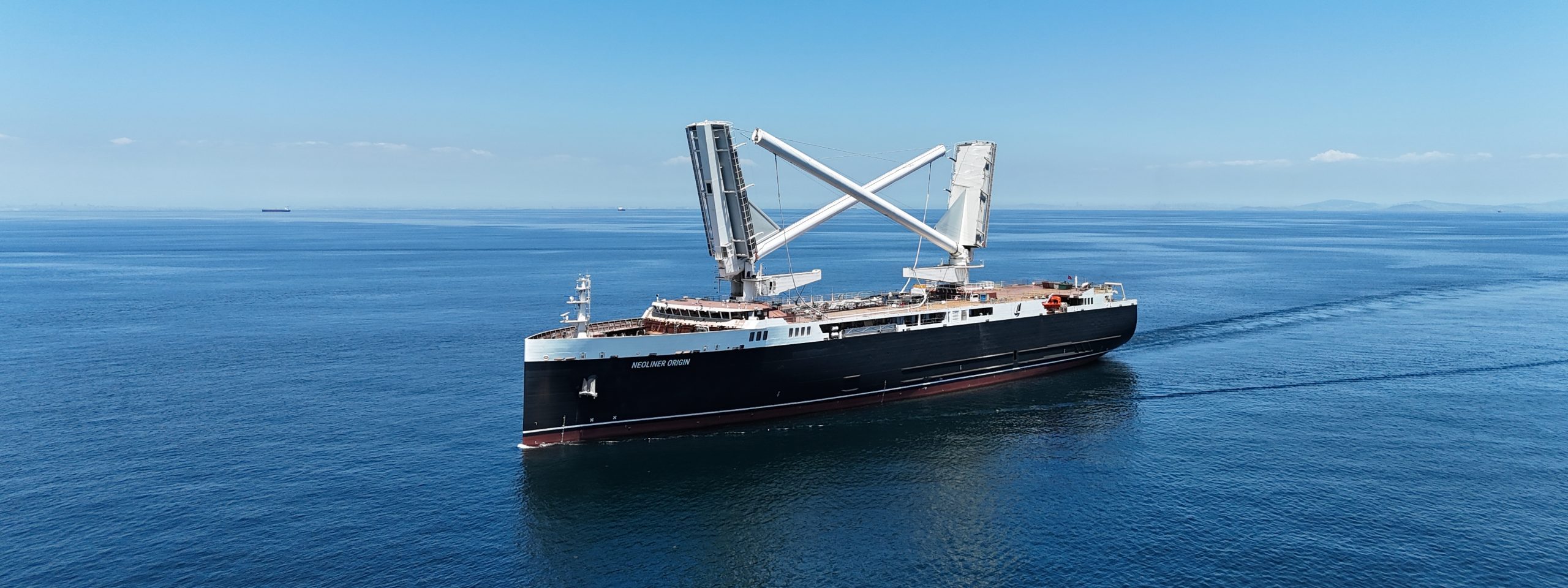 wind powered cargo ship,
Neoliner Origin sail vessel,
low emission shipping technology,
wind propulsion cargo vessel,
Neoline sustainable shipping,
industrial sail powered ship,
eco friendly ro-ro vessel,
rigid wing sail cargo ship,
modern wind assisted marine transport,
zero emission maritime logistics,
wind powered ro-ro ship under sail,
sustainable transatlantic shipping,
green maritime innovation,
wind energy ship propulsion,
clean shipping alternative,
ocean freight decarbonization,
wind driven cargo transport,
sustainable ship design,
renewable energy maritime vessel,
green shipping technology