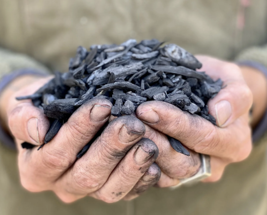 New York Carbon has a facility located between the Catskill Mountains and the Hudson River. They produce high carbon biochar from local waste biomass in their Tigercat Carbonator 6050. Image via NY Carbon.