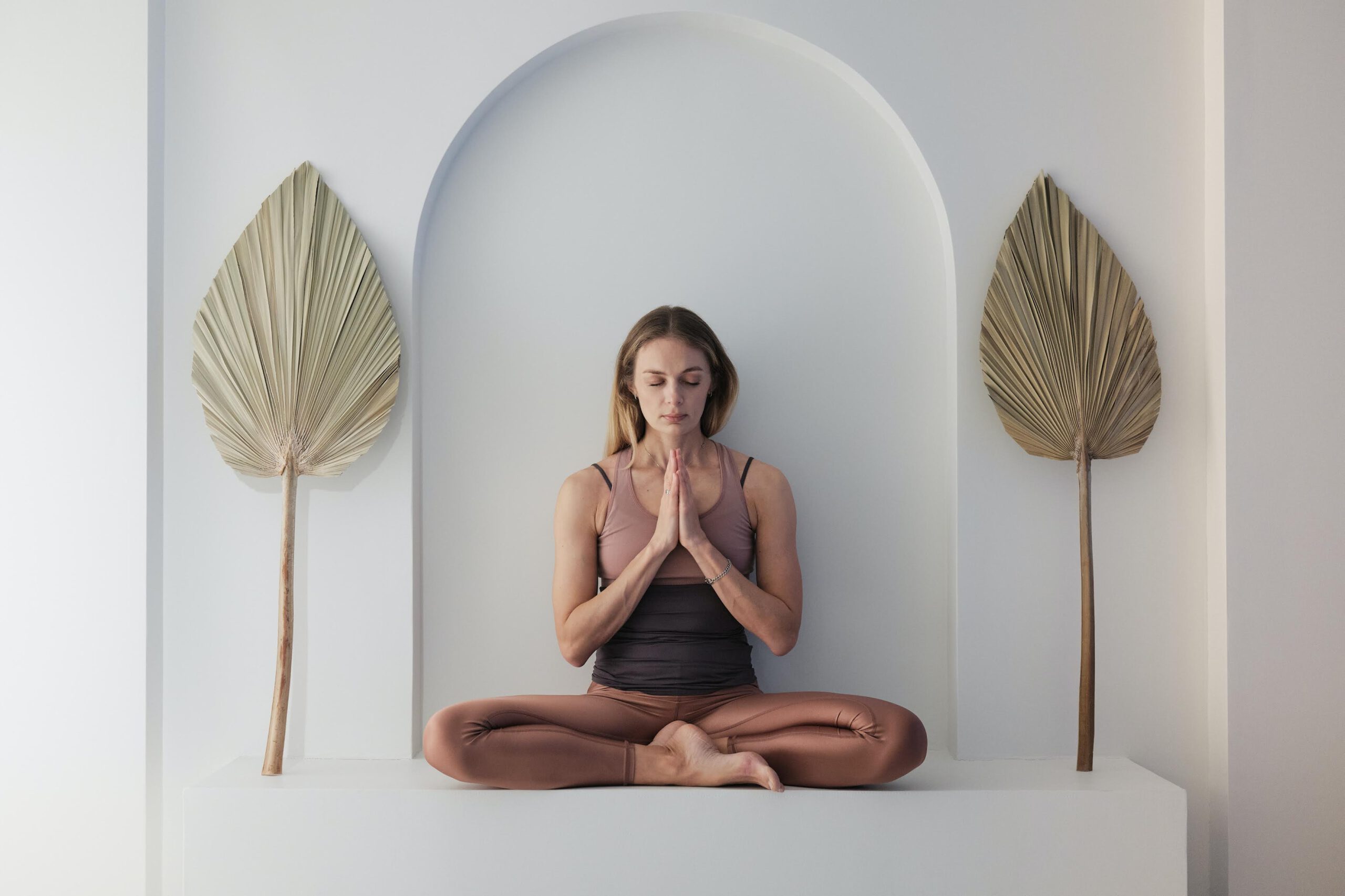 online fitness training, woman in lotus position