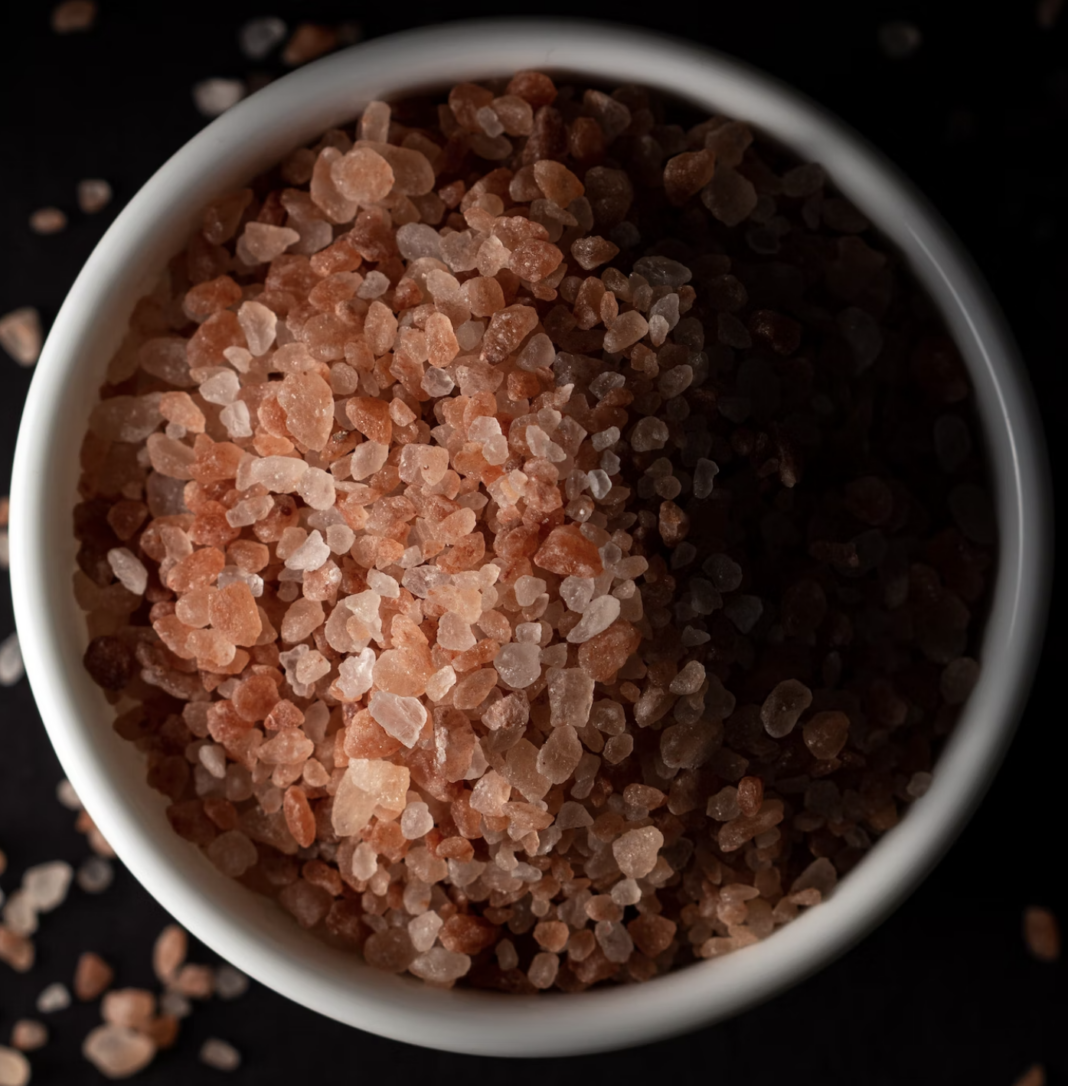 A small pot of rough pink, himalayan salt