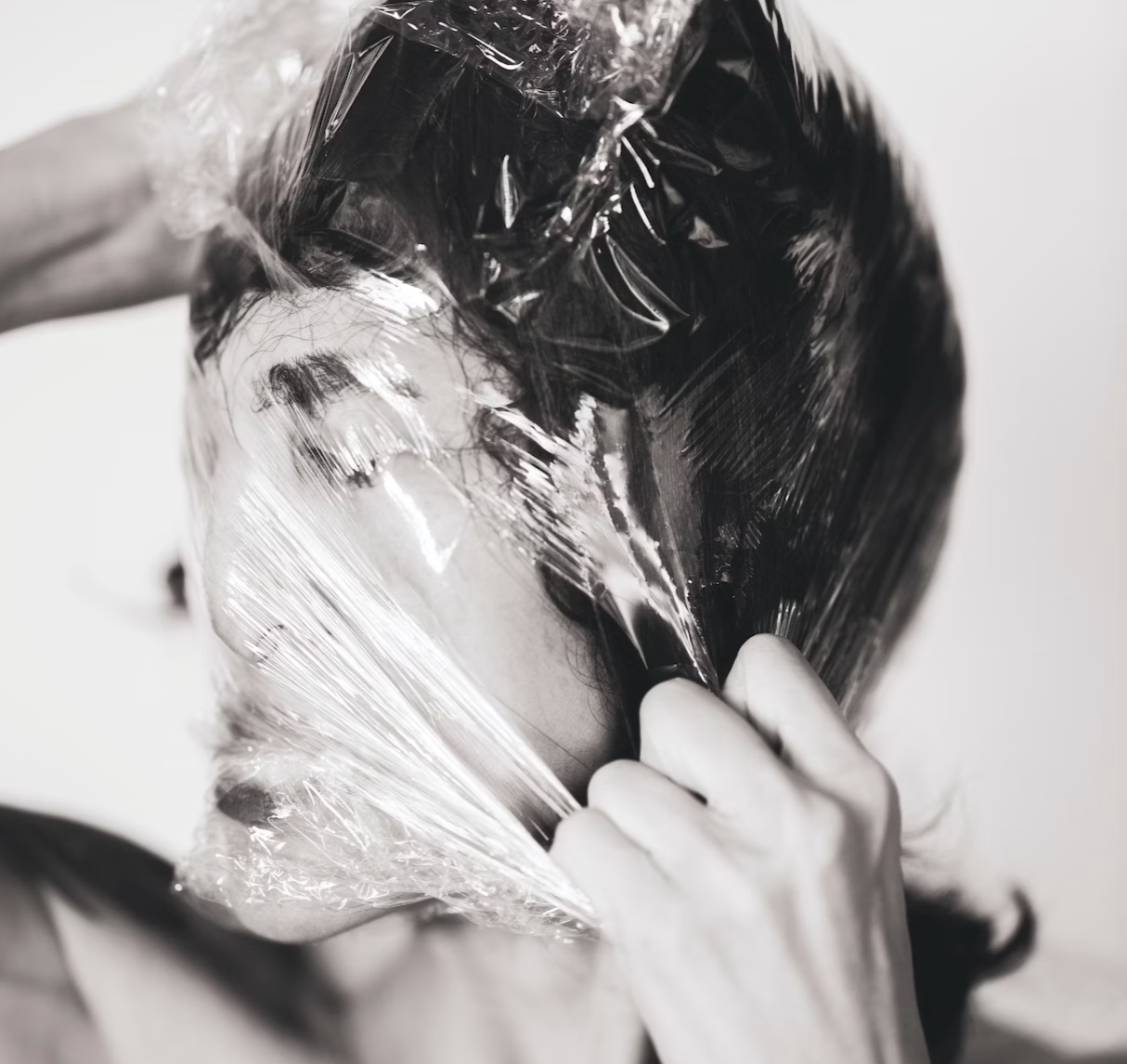 plastic surgery, man with plastic film wrap on his face