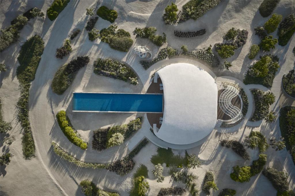 Shebara hotel Saudi Arabia, Red Sea luxury resort, eco design, modern architecture, beachfront villas, sustainable tourism, desert island destination, travel experience