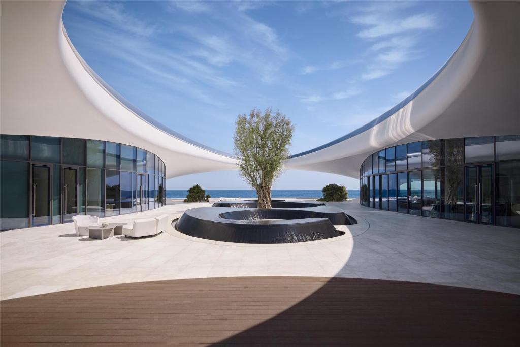 Shebara hotel Saudi Arabia, Red Sea luxury resort, eco design, modern architecture, beachfront villas, sustainable tourism, desert island destination, travel experience, eco travel, mirror pods, KSA