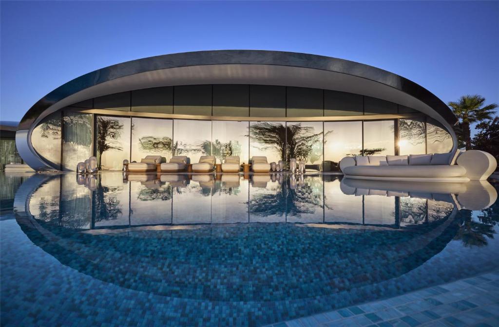 Shebara hotel Saudi Arabia, Red Sea luxury resort, eco design, modern architecture, beachfront villas, sustainable tourism, desert island destination, travel experience, eco travel, mirror pods, KSA