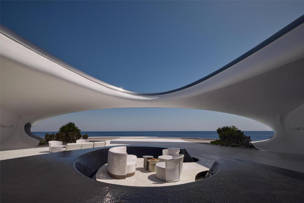 Shebara hotel Saudi Arabia, Red Sea luxury resort, eco design, modern architecture, beachfront villas, sustainable tourism, desert island destination, travel experience, eco travel, mirror pods, KSA